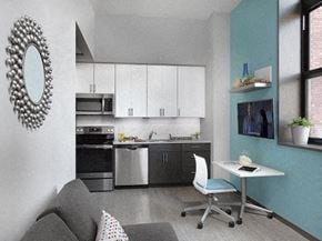 Saint Louis apartment for rent - a small kitchen with a desk and a chair