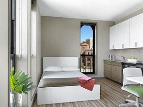 Saint Louis apartment for rent - a white bedroom with a bed and a window