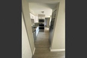 Buffalo apartment for rent - a view of a kitchen from a hallway