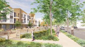Fullerton apartment for rent - A street view of a residential area with people walking and biking.