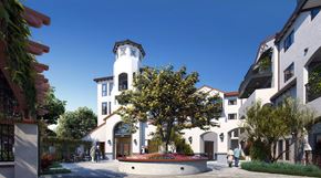 La Puente apartment for rent - a city street with buildings and a clock tower