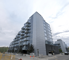 Calgary apartment for rent - A large building with a lot of windows and balconies.