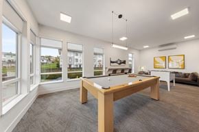 Surrey townhouse for rent - A room with a pool table and a couch.