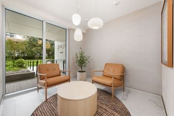 Coquitlam apartment for rent - A room with two chairs and a table.