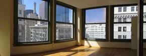 Los Angeles apartment for rent - A room with a view of the city through large windows.