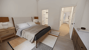 Spanish Fort apartment for rent - A bedroom with a large bed and a striped rug on the floor.