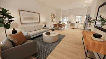 Spanish Fort apartment for rent - A modern living room with a grey sofa and a wooden coffee table.