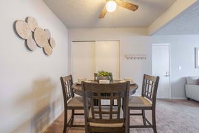 New Albany apartment for rent - A dining room with a table and chairs.