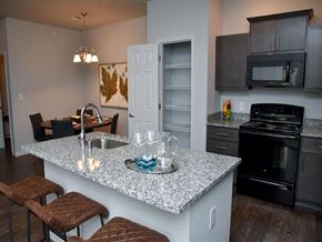 Louisville apartment for rent - a kitchen with a granite counter top