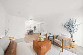 Compton apartment for rent - a living room with a couch and a table