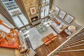 Mountainside apartment for rent - A living room with a glass table and a couch.