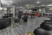 Franklin Lakes apartment for rent - a game room with a pool table and couches