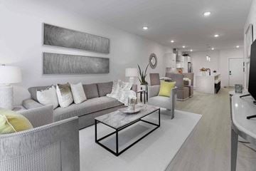 Franklin Lakes apartment for rent - a living room with couches and a table