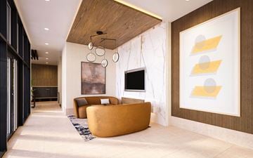 Woodbridge apartment for rent - A modern living room with a brown sofa and a large abstract painting on the wall.