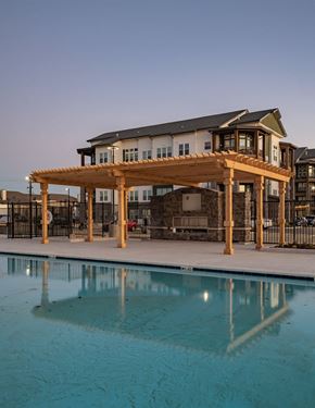 Rogers apartment for rent - a building with a pool in front of it at Fitzroy Grove, Arkansas, 72758