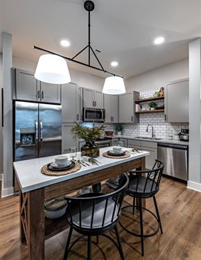 Rogers apartment for rent - a kitchen with a large island with three chairs at Fitzroy Grove, Rogers, 72758