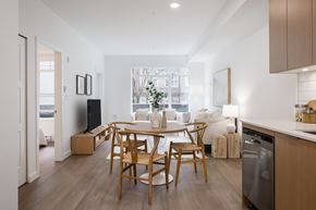 Langley apartment for rent - A modern kitchen with a dining table and chairs.