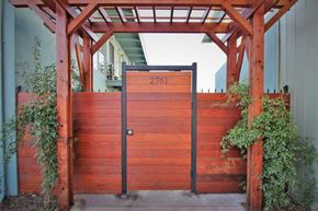 Concord apartment for rent - a wooden gate with a number on it