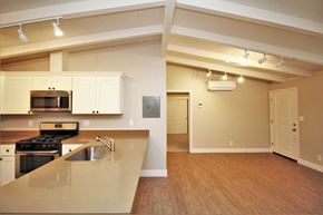 Lafayette apartment for rent - a kitchen with an island and a stove and a microwave