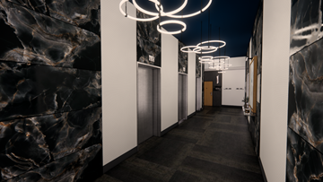 Edmonton apartment for rent - A hallway with marble walls and ceiling, and a series of circular lights hanging from the ceiling.