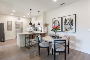 Burleson apartment for rent - A dining room with a table set for four.