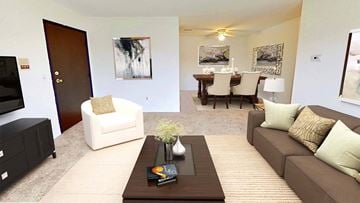 Warren apartment for rent - a living room with a couch and a table