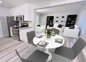 Howell apartment for rent - an open kitchen and living room with a table and chairs