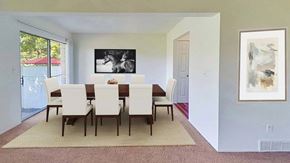 Grand Blanc apartment for rent - A dining room with a table and chairs.