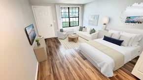 Toledo apartment for rent - A bedroom with a large bed and a flat screen TV.