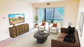 Flint apartment for rent - A living room with a flat screen TV and a large window.