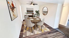 Kentwood apartment for rent - A dining room with a table and chairs.
