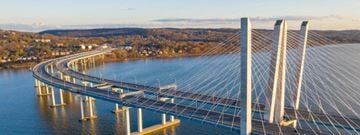 Dobbs Ferry apartment for rent - A large, modern bridge spans across a body of water.
