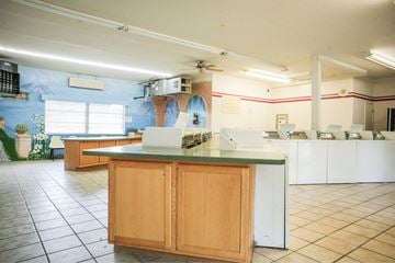St. Louis apartment for rent - A kitchen with a counter and cabinets.