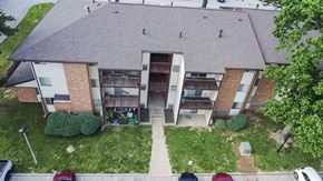 Black Jack apartment for rent - A large house with a driveway and a garage.