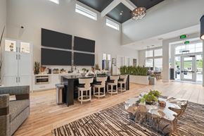 Knoxville townhouse for rent - A modern kitchen with a dining table and chairs.