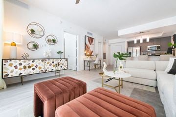 Miami apartment for rent - a living room with a couch and a table