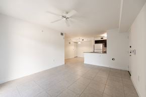 Homestead apartment for rent - A spacious room with a ceiling fan and tiled floor.