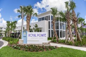 Miami apartment for rent - A sign that says Royal Pointe in front of a building.