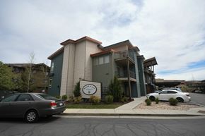 Park City apartment for rent - a building with a car parked in front of it