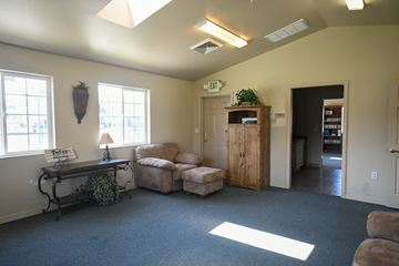 Logan apartment for rent - a living room with couches and a table