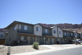 Moab apartment for rent - a row of houses with mountains in the background