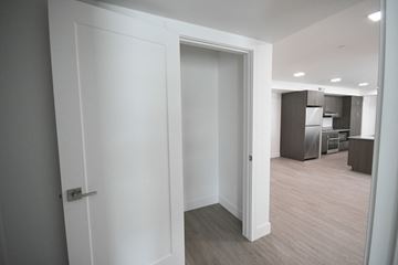 Park City apartment for rent - a white door leading into a living room and a kitchen