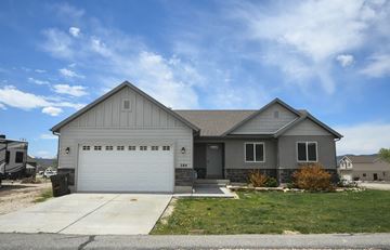 Francis apartment for rent - a gray house with a white garage door