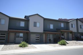 Moab apartment for rent - the front of a building with a sidewalk in front of it