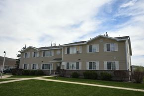 Kamas apartment for rent - a large house with a sidewalk in front of it