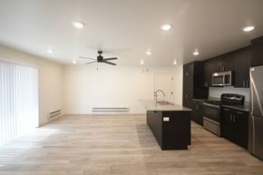 Park City apartment for rent - a kitchen and living room in a new home