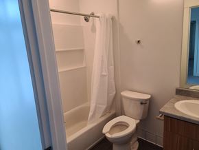 Park City apartment for rent - a bathroom with a shower and a toilet and a sink