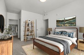 Salt Lake City apartment for rent - A bedroom with a large bed and a painting on the wall.