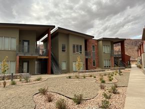 Moab townhouse for rent - Buildings with landscaping.