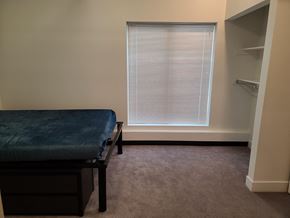 Park City apartment for rent - a patient room with a bench and a window
